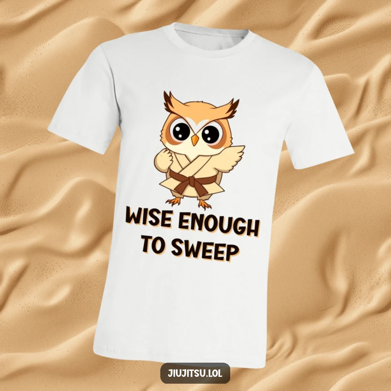 Funny Owl Judo Sweep T-Shirt: A small, stout owl dressed in a miniature gi playfully executes a judo sweep, highlighting humorous perseverance.